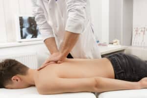 Patient having Deep tissue massage in Milton Keynes